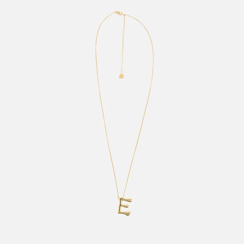 ASTRID 
MIYU Astrid 
Miyu Initial Bold 18K Gold-Plated Necklace 1