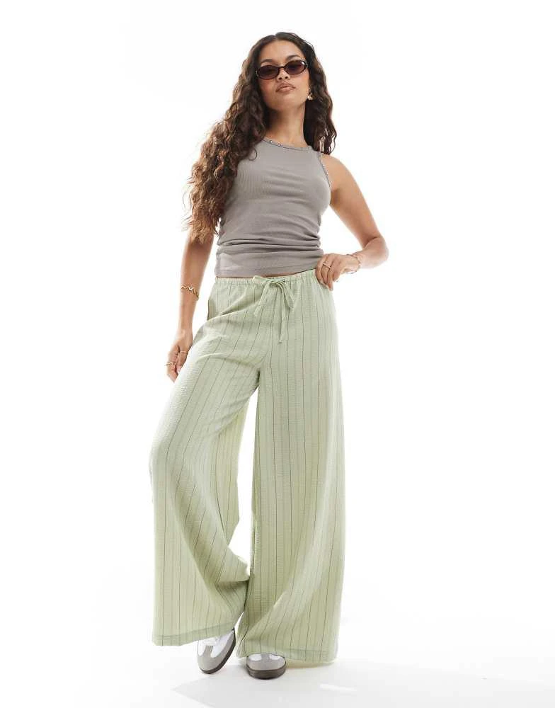 Stradivarius Stradivarius Petite linen look wide leg trouser in khaki stripe 1
