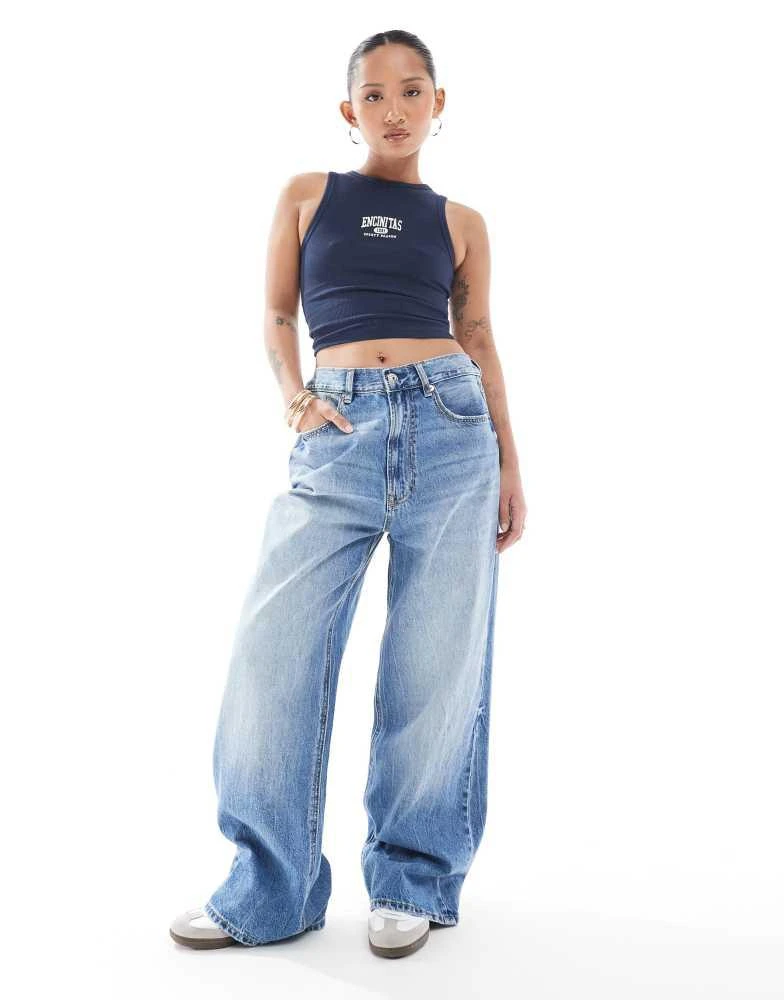 Stradivarius Stradivarius Petite D88 denim baggy jean in mid wash 1