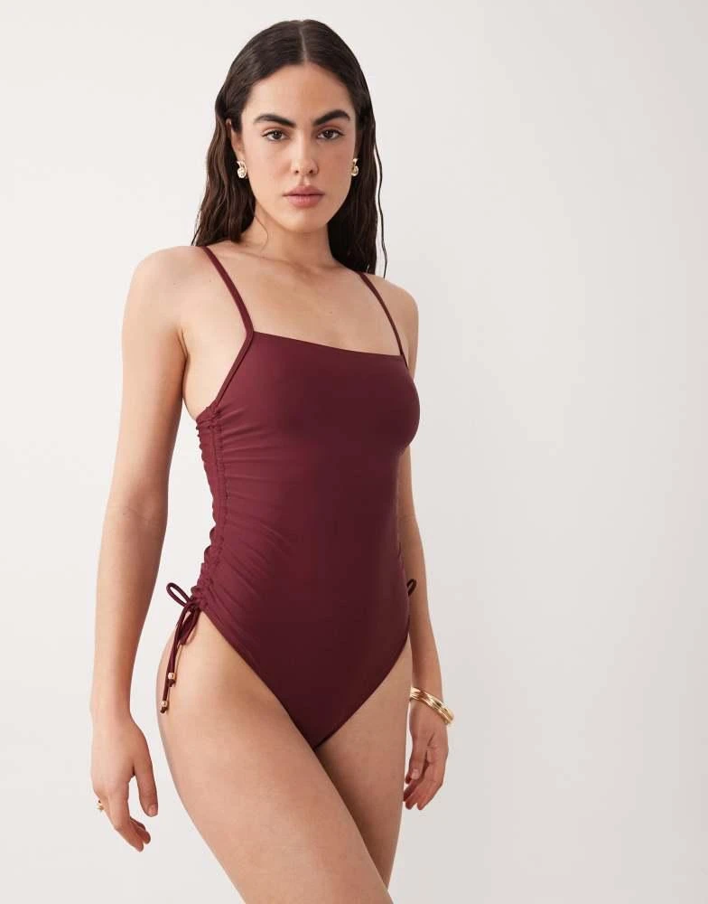 Miss Selfridge Miss Selfridge ruched side swimsuit in plum