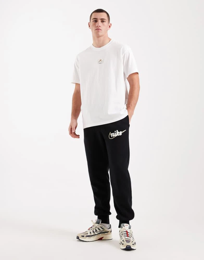 NIKE Nike Club joggers with swoosh detail in black 2