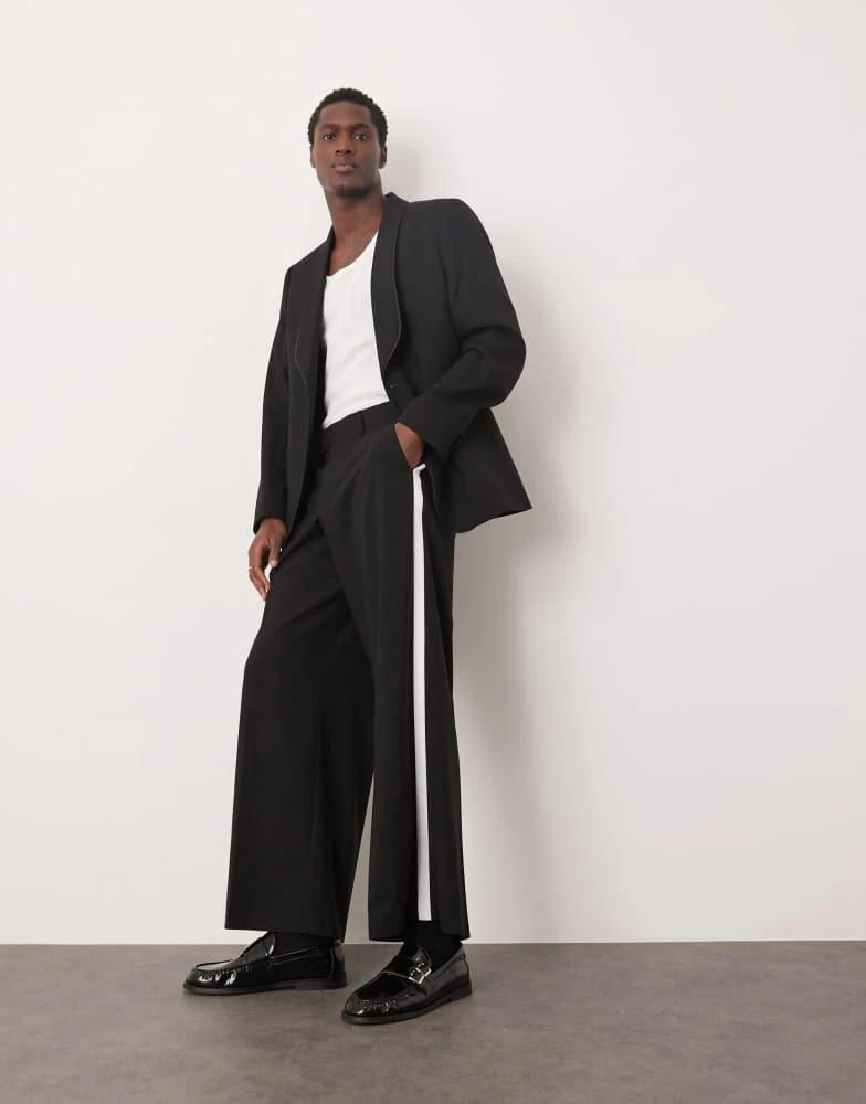 ASOS ASOS DESIGN smart loose fit tuxedo trousers in black with white side stripe 1