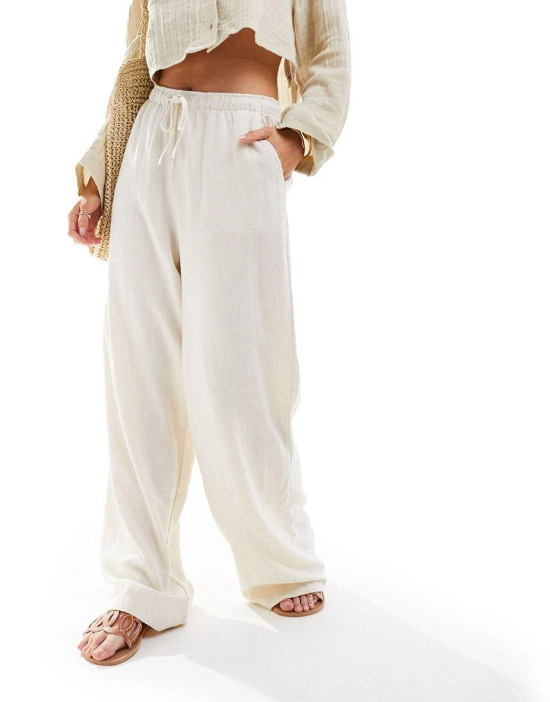 Stradivarius Stradivarius Petite linen look pull on trouser in natural 2