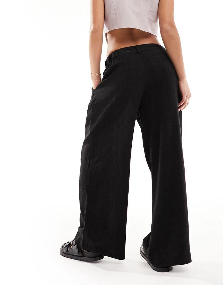 ASOS ASOS DESIGN Petite relaxed straight leg trousers with linen in black 5
