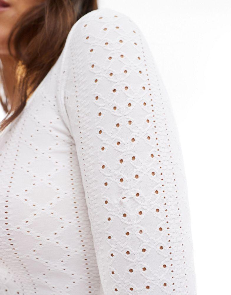 Hollister Hollister long sleeve textured eyelet scoop top in white with built in support