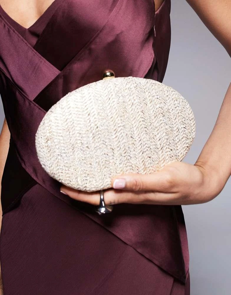 True Decadence True Decadence round structured woven clutch bag in gold metallic 1