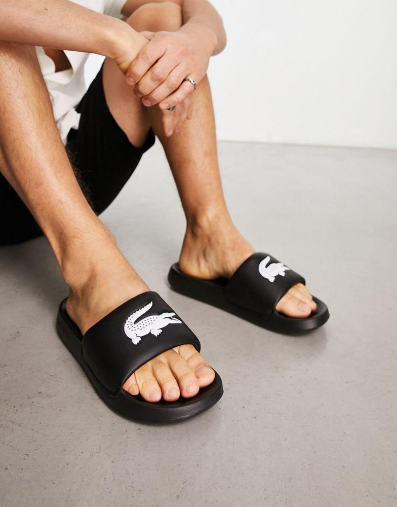 【LACOSTE】Serve 1.0 Sliders ロゴ入り スライダー ♪ Lacoste Lacoste Serve 1.0 sliders in black - Sandals