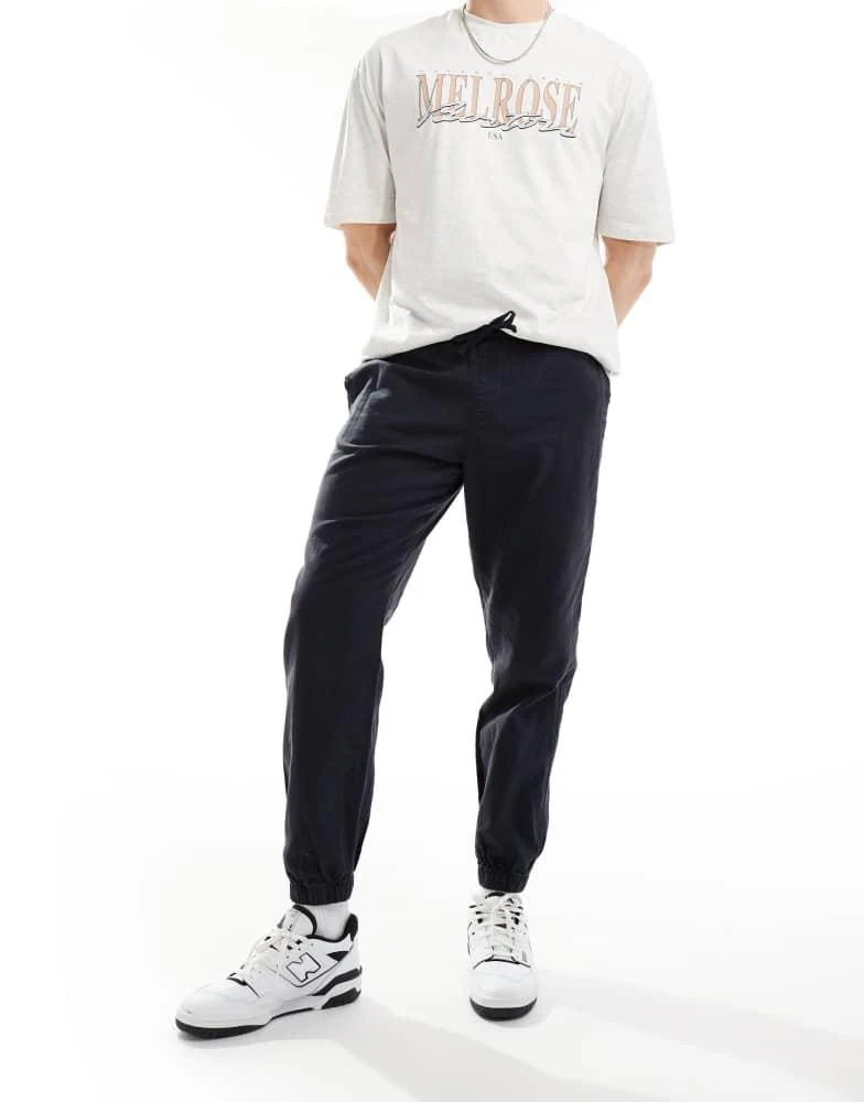 ASOS ASOS DESIGN tapered pull on linen trouser in washed navy 2