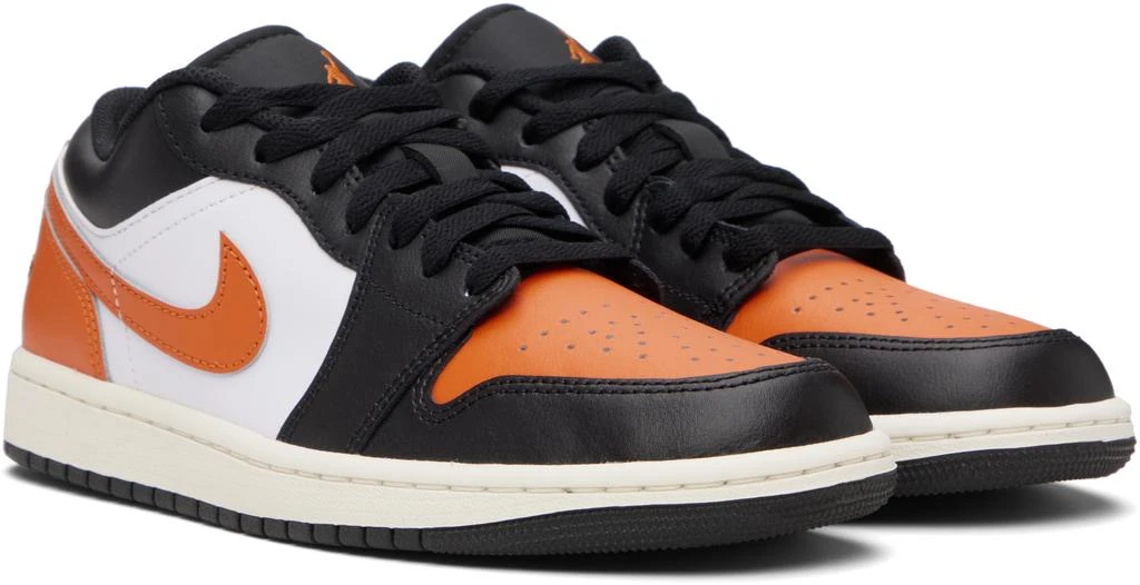 Jordan Black
Orange Air Jordan 1 Low Sneakers 4