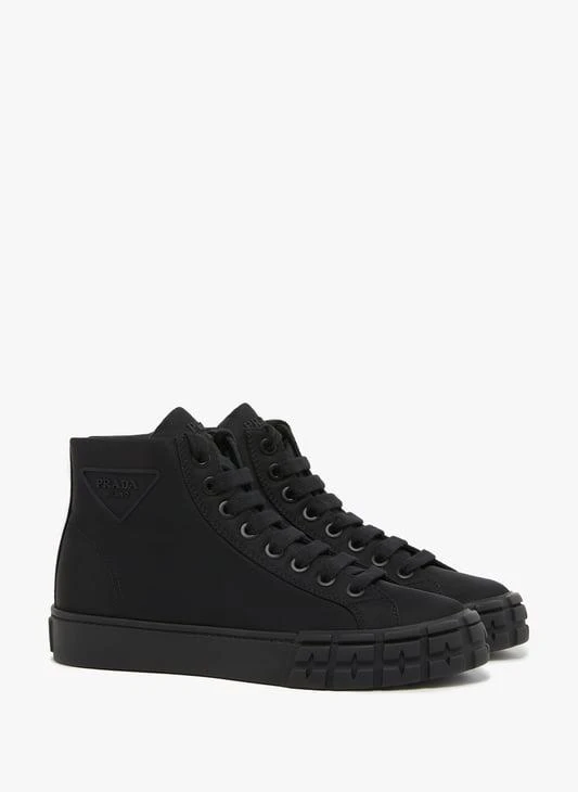 Prada High-top thick-sole Sneakers with embossed logo 1