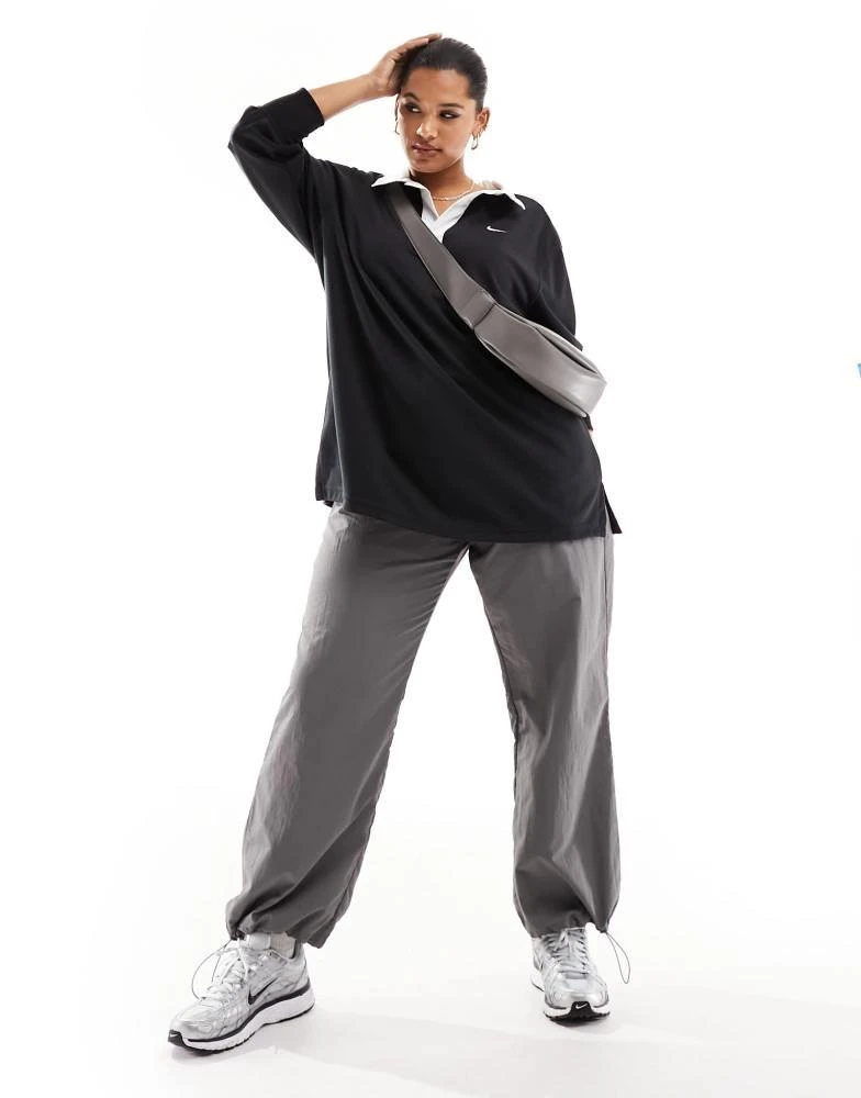 NIKE Nike Plus essential oversized long sleeve polo top in black 2
