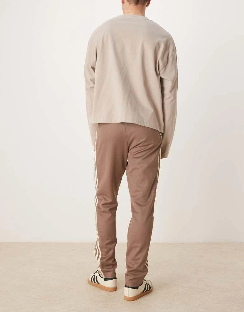 Adidas adidas Originals Classics track pants in brown 5