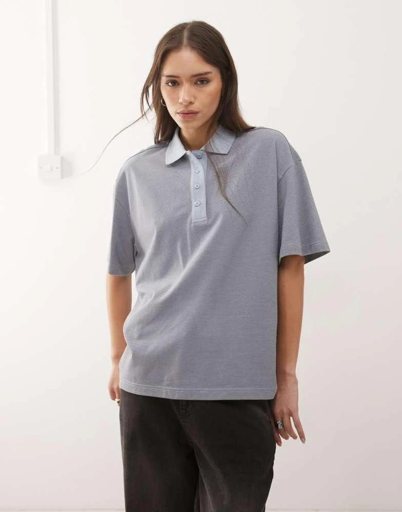 Monki Monki boxy fit short sleeve polo shirt in blue stripe
