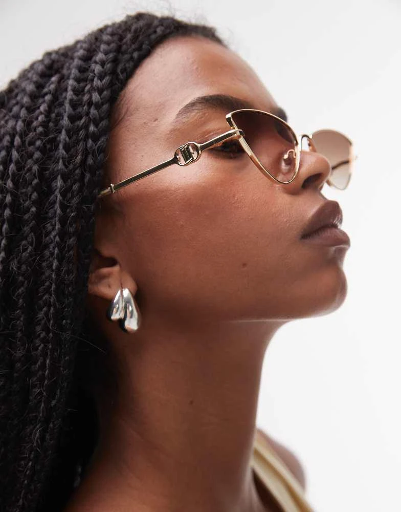 Le Specs Le Specs the soiree slim metal cat eye sunglasses in gold 3