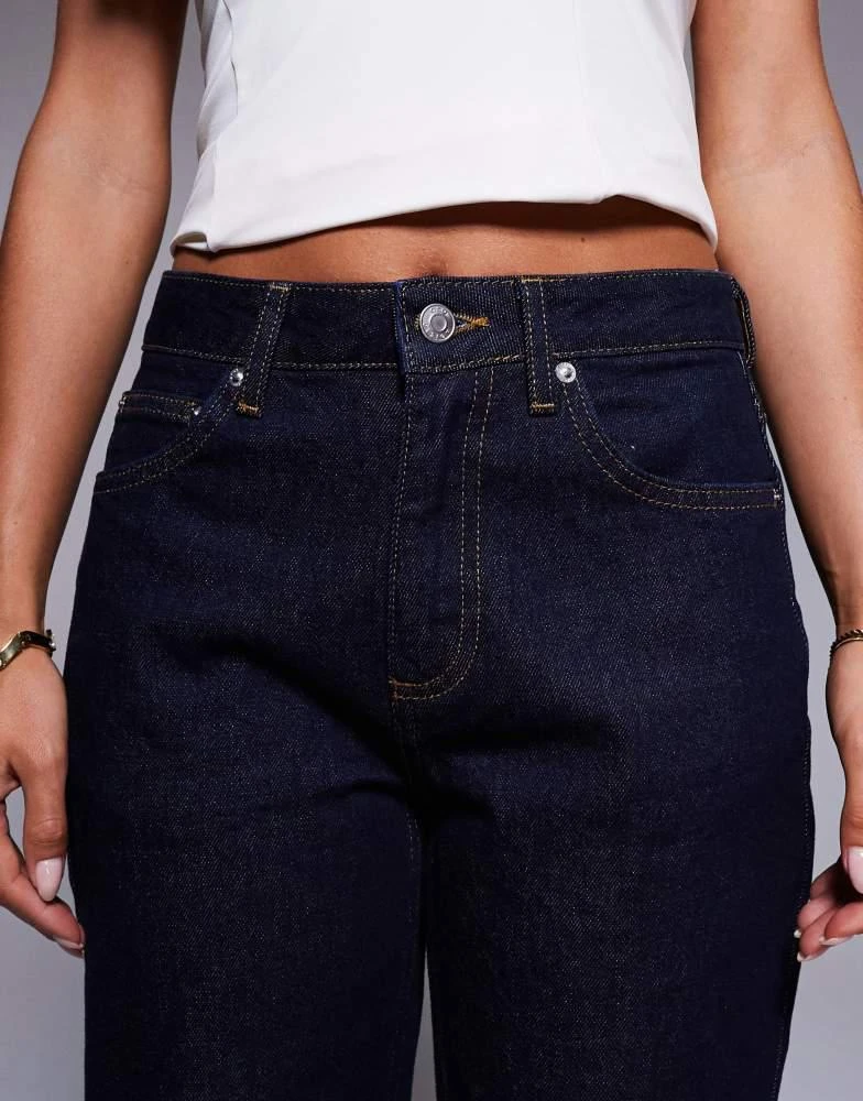 Shop ASOS DESIGN Petite comfort stretch straight leg jean in rinse