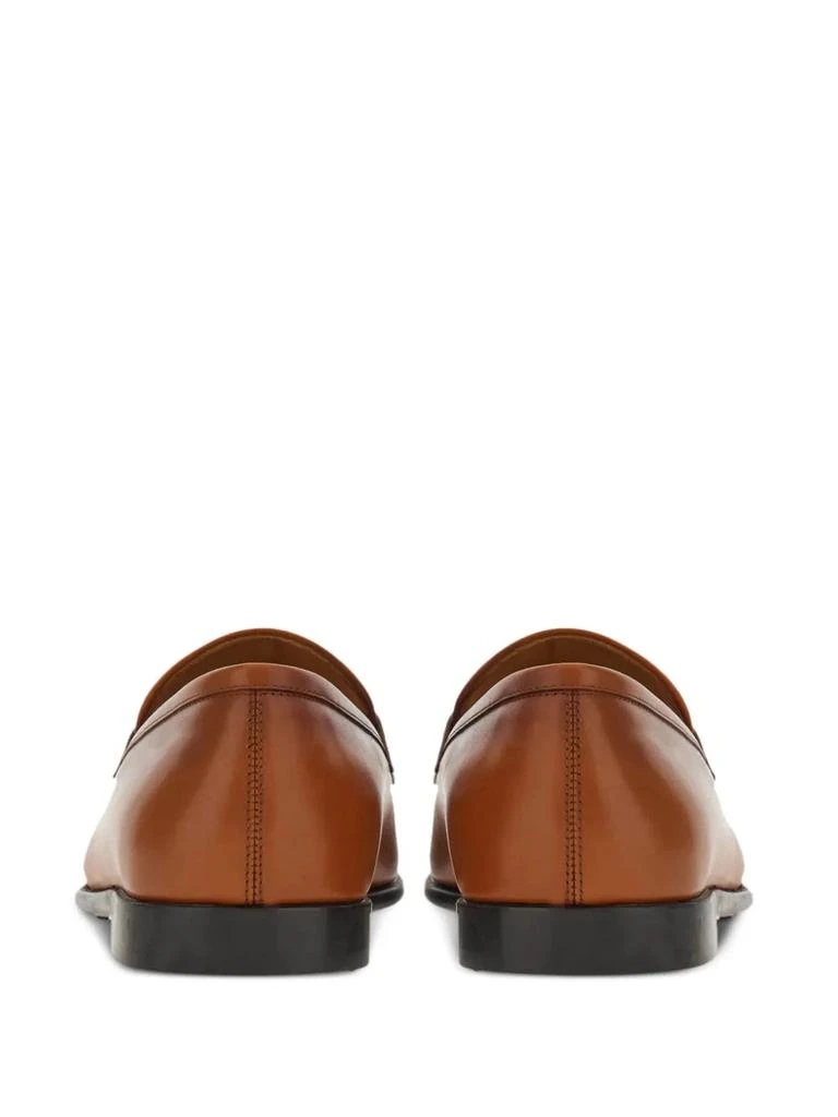 Shop Ferragamo Gancini-Plaque Leather Loafers in BROWN on  display picture 2