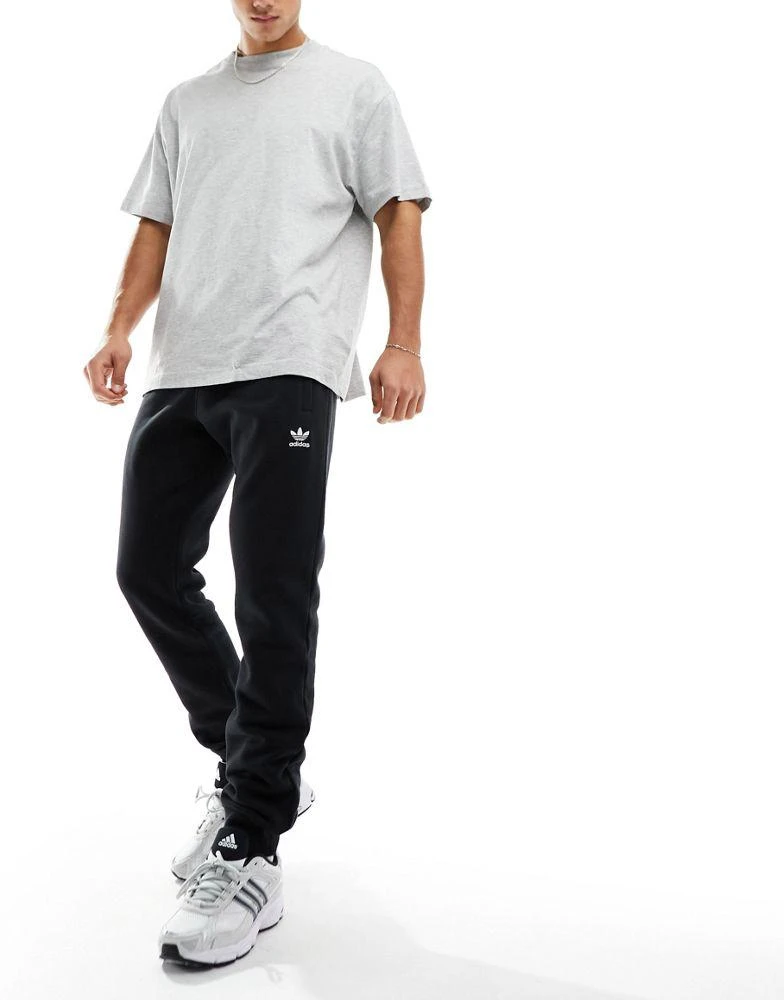 Adidas adidas Originals Essentials joggers in black 1