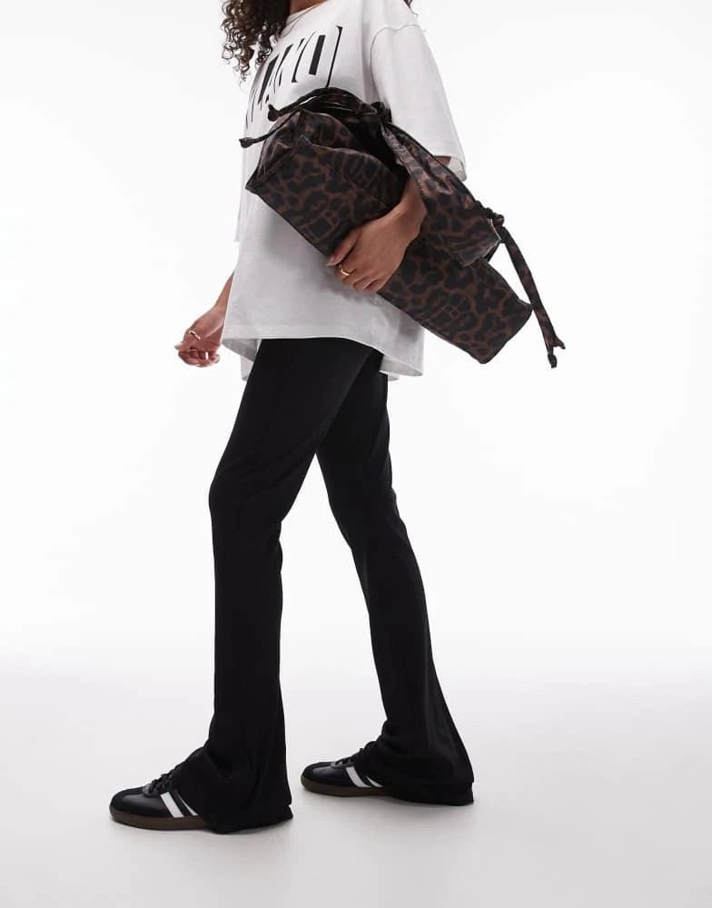 Topshop Topshop skinny rib flared trouser in black 1