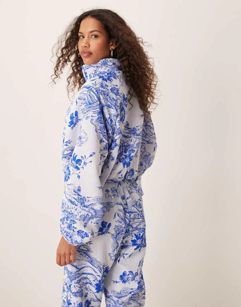 NIKE Nike MDC jaquard floral jacket in blue and white 4