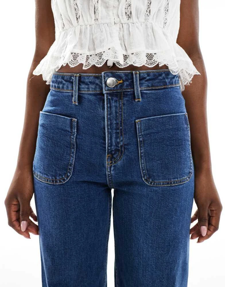 Bershka Bershka high waisted pocket detail jeans in mid wash 5