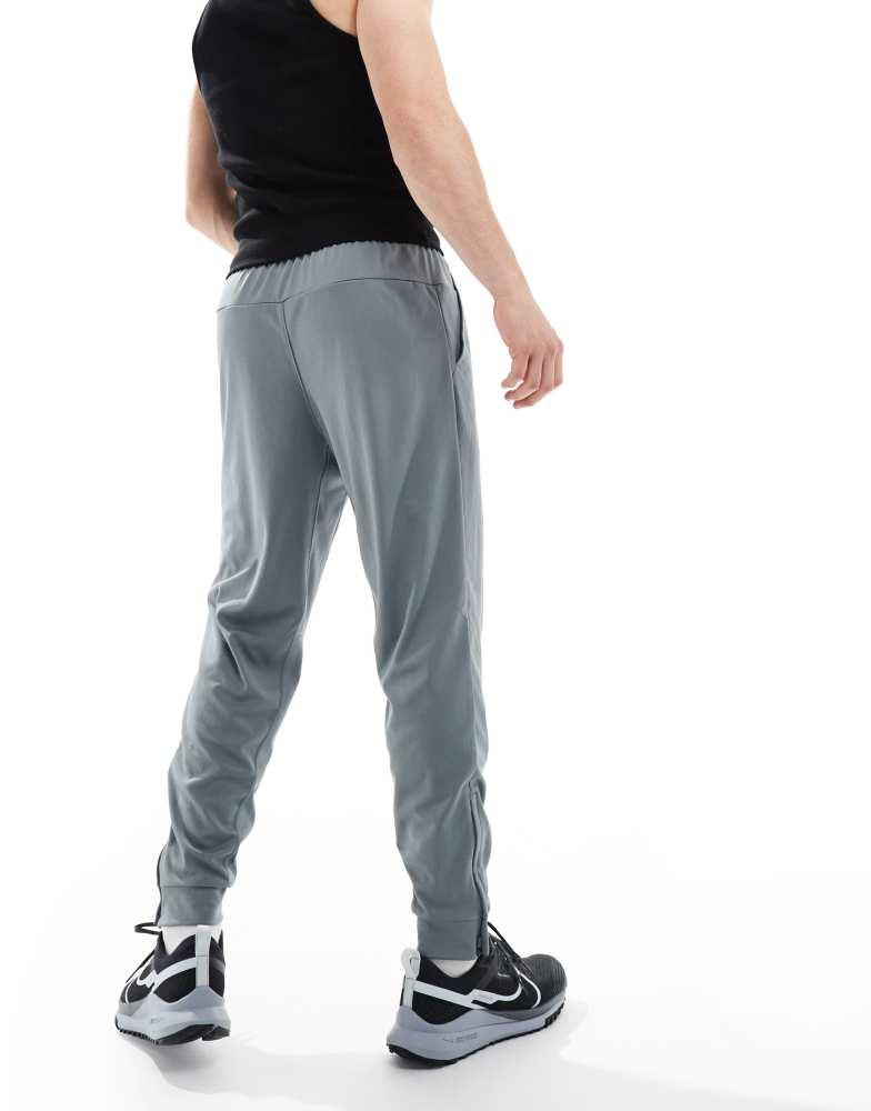 nike training tapered jogging bottoms grey