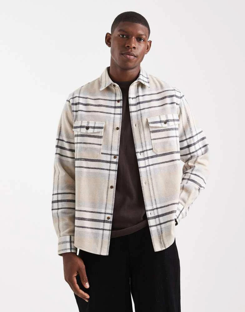 Shop ASOS DESIGN regular fit check shirt in beige on Sale at
