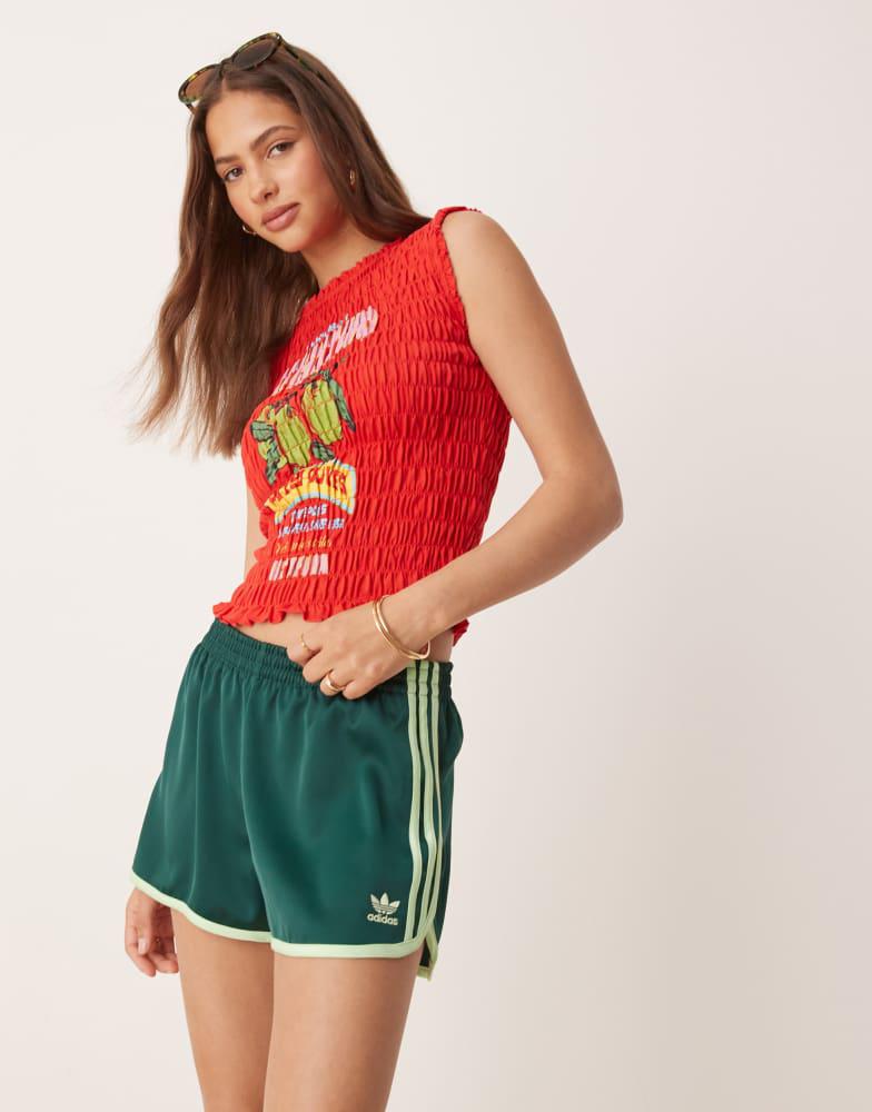 Shop adidas Originals three stripe sprinter shorts in green Shop adidas Originals three stripe sprinter shorts in green