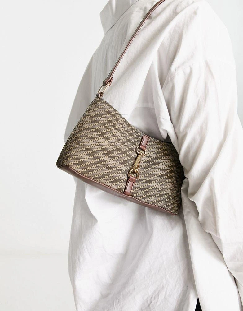 ASOS ASOS DESIGN 90s shoulder bag in monogram print with hardware clip 1