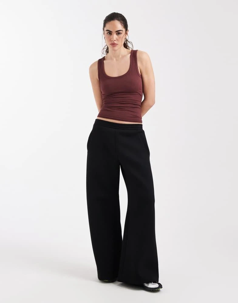 ASOS ASOS DESIGN bra free seamless rib scoop neck vest in rust - Gilets ...
