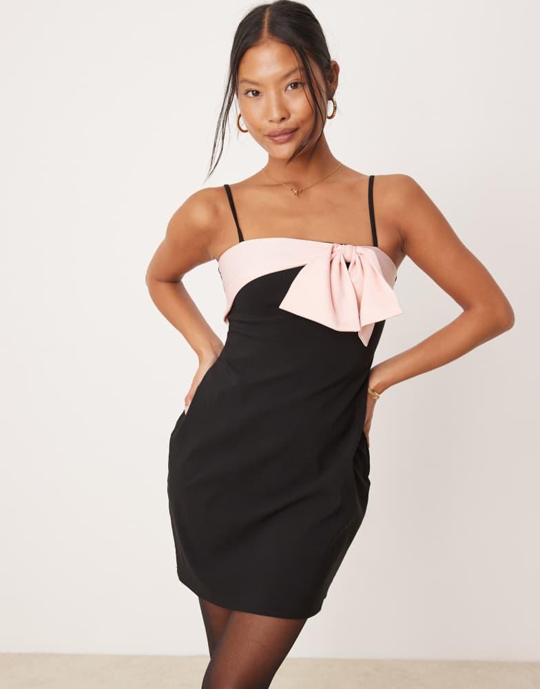 ASOS ASOS DESIGN Petite strappy cami mini dress with bow detail in pink