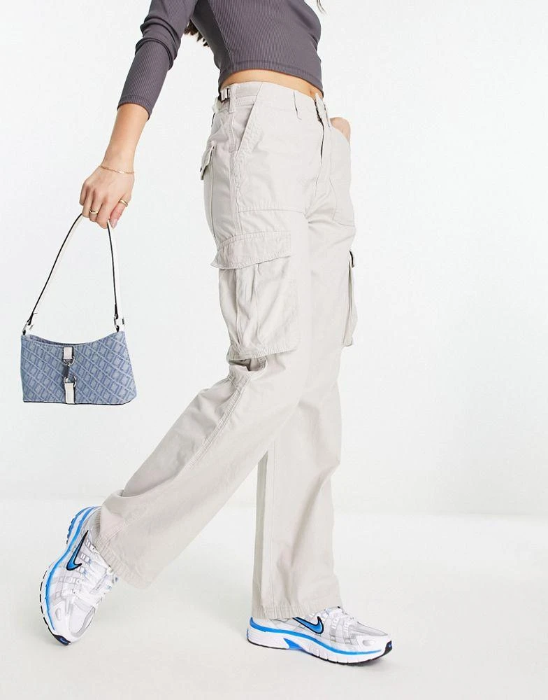 Bershka Bershka Petite straight leg cargo trousers in stone 4