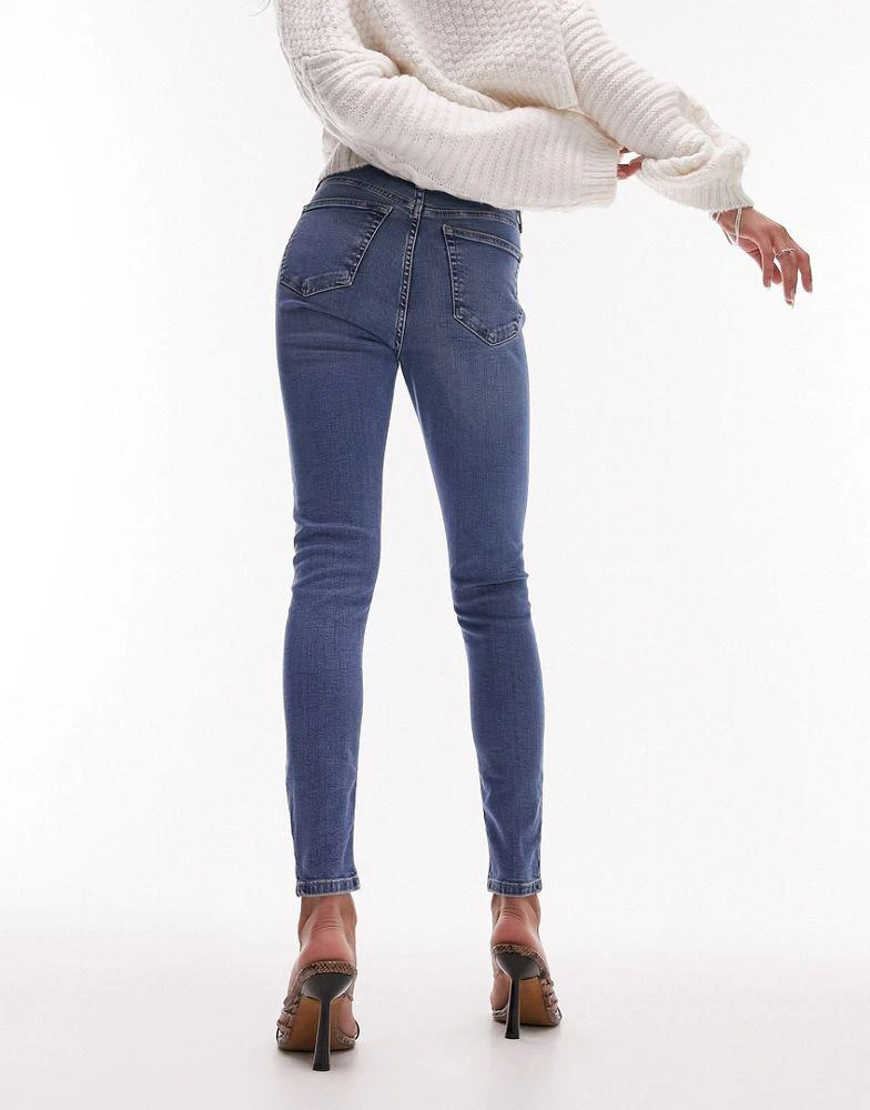 Topshop Topshop high rise Jamie jeans with rips in mid blue 2