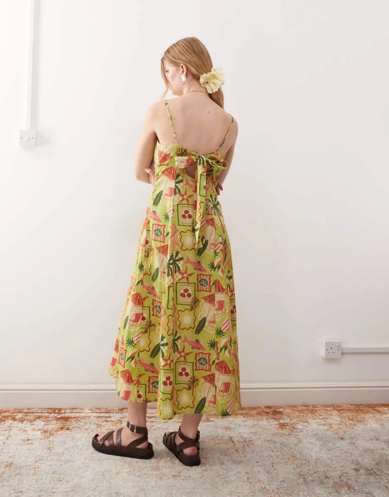 Reclaimed Vintage Reclaimed Vintage midi dress with bust cup detail and godets in holiday postcard print 4