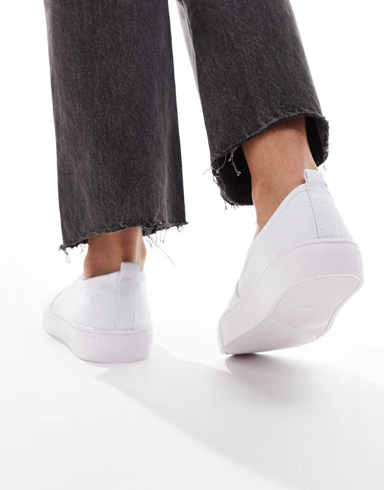 ASOS ASOS DESIGN Wide Fit Dotty slip on plimsolls in white 4