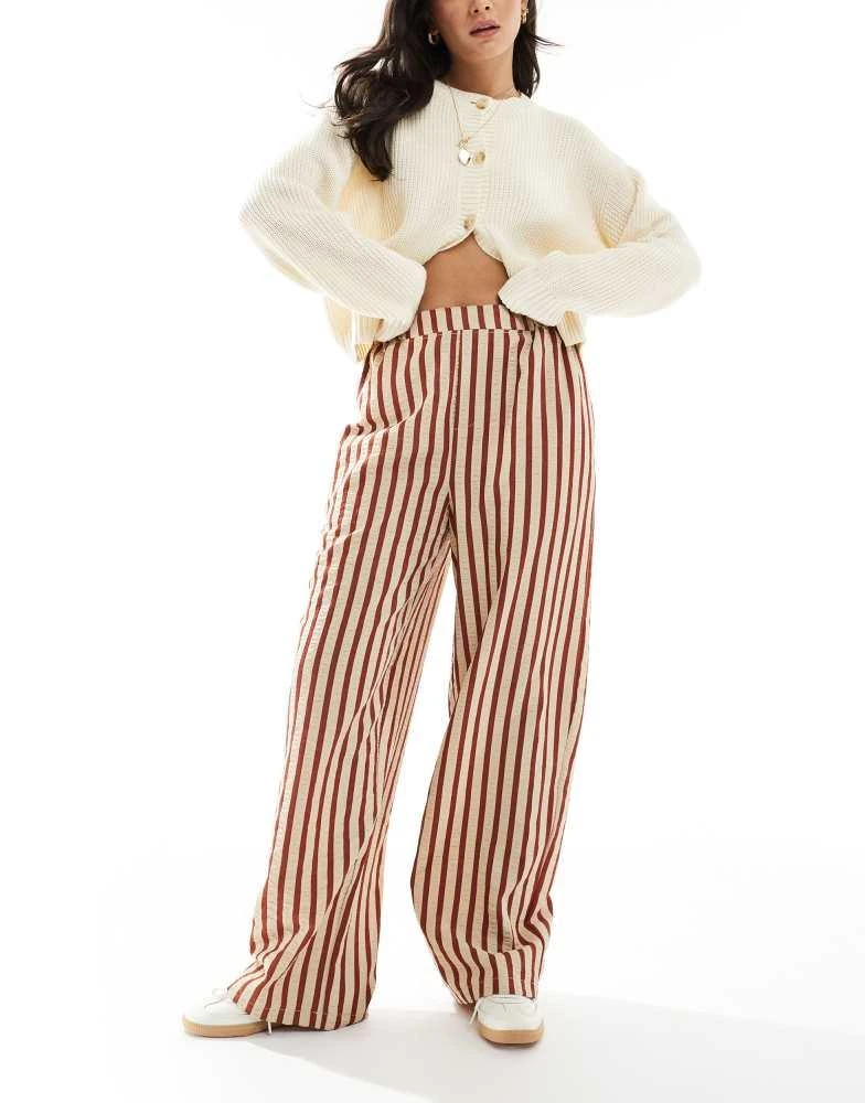 ASOS ASOS DESIGN straight leg seersucker trousers in rust stripe 1