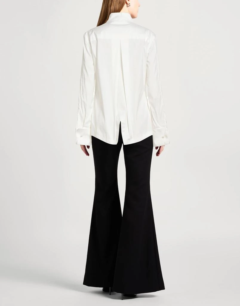 Tom Ford Solid color shirts
blouses 3