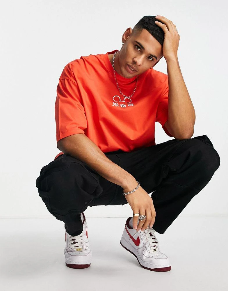ASOS ASOS DESIGN oversized t-shirt with Disney Mickey Mouse print in red 4