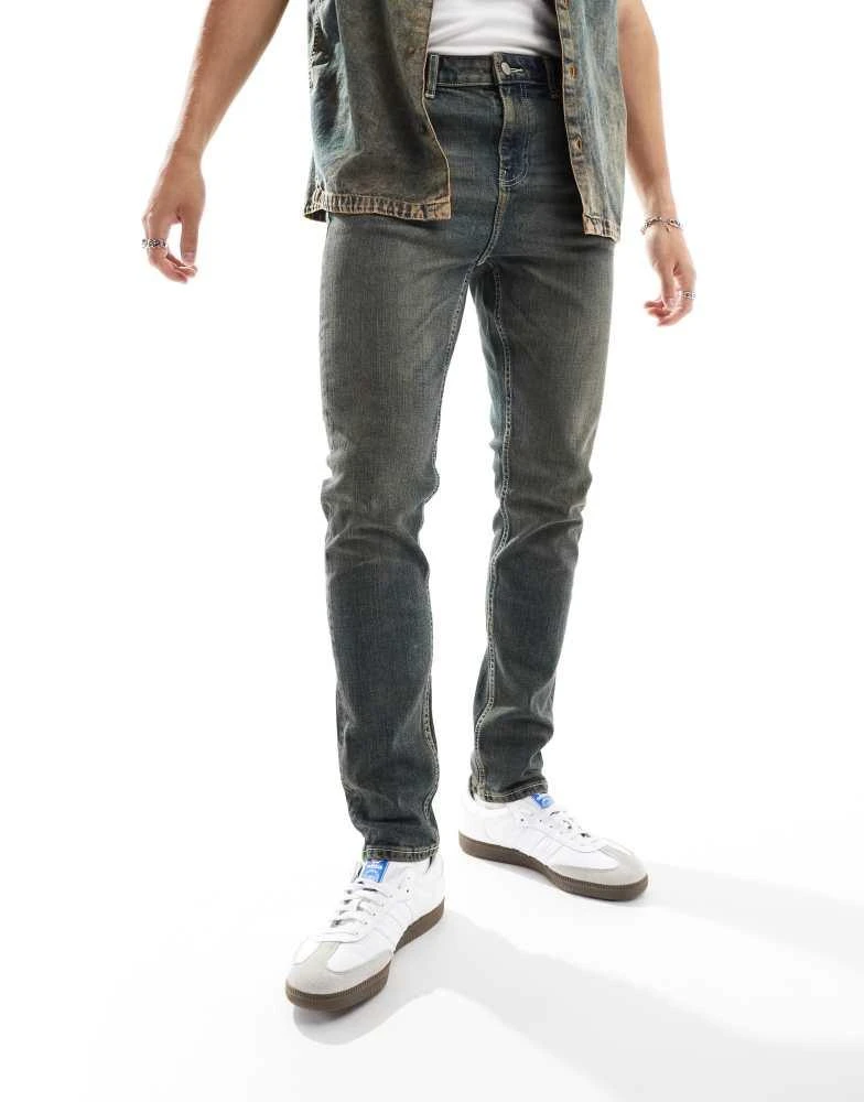 ASOS ASOS DESIGN skinny jeans in dark wash blue with tint 2