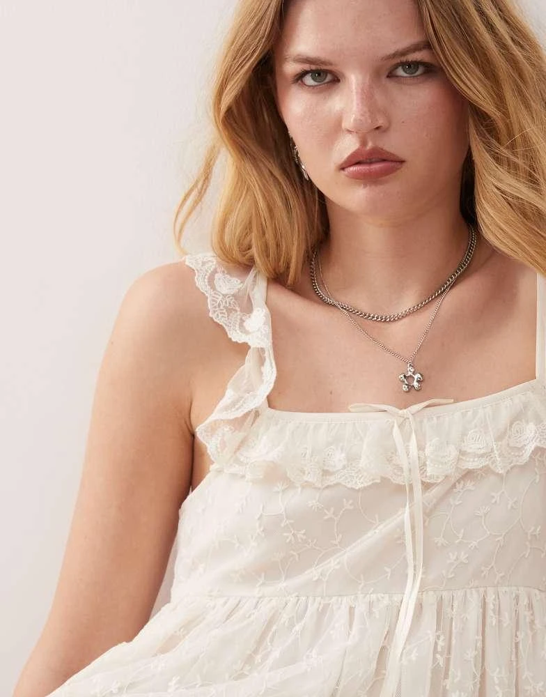 Reclaimed Vintage festival mini babydoll dress with lace inserts in White