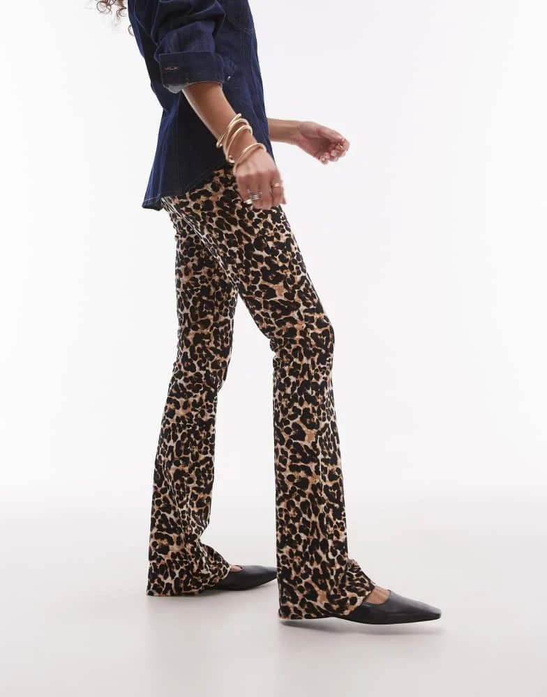 Shop Topshop leopard print bootcut trouser in brown on Sale at