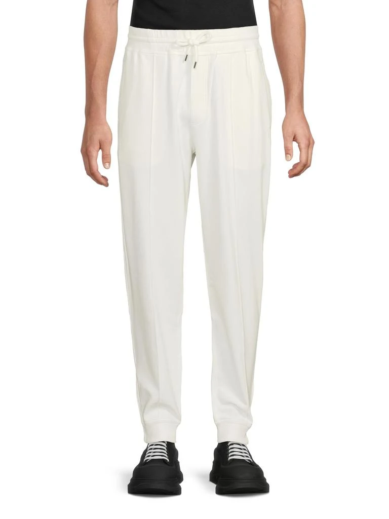 Brunello Cucinelli ​Tapered Cotton-Blend Trousers 1