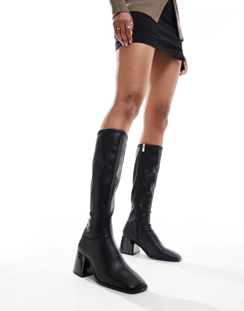 ASOS ASOS DESIGN Cloud flared block heel sock knee boots in black 1