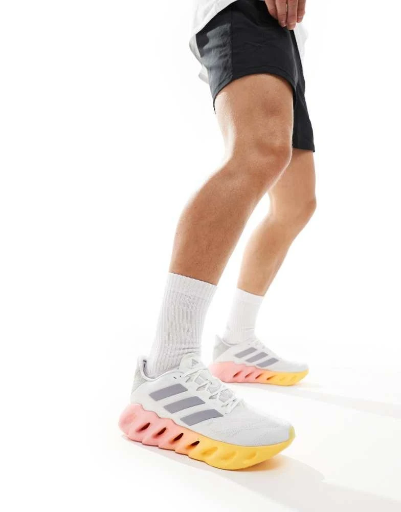 Adidas adidas Running Switch FWD 2 trainers in white and orange 1