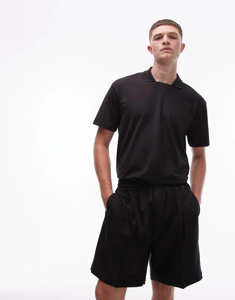 Topman Topman oversized fit retro polo in black 1