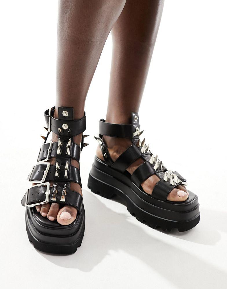 Koi Footwear Koi The Mage Resistor spiked gladiator sandals in black