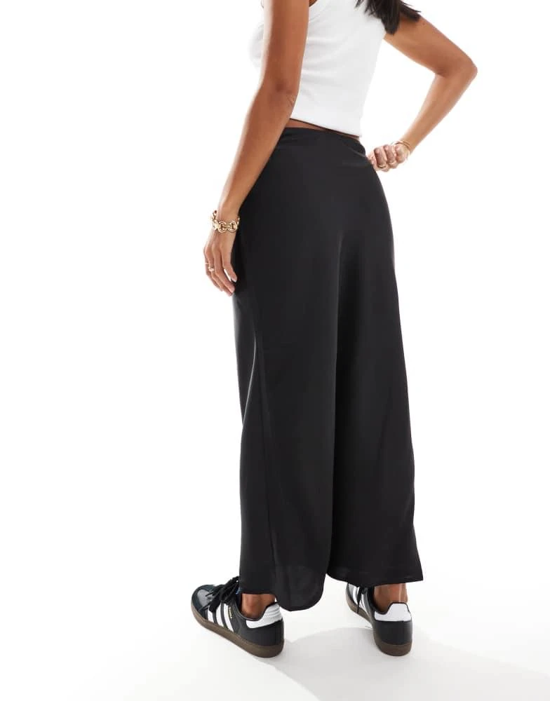 ASOS ASOS DESIGN Petite satin bias midi skirt in black 2