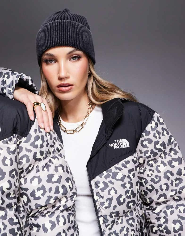 The North Face The North Face Saikuru logo puffer jacket in grey leopard print exclusive to ASOS 2