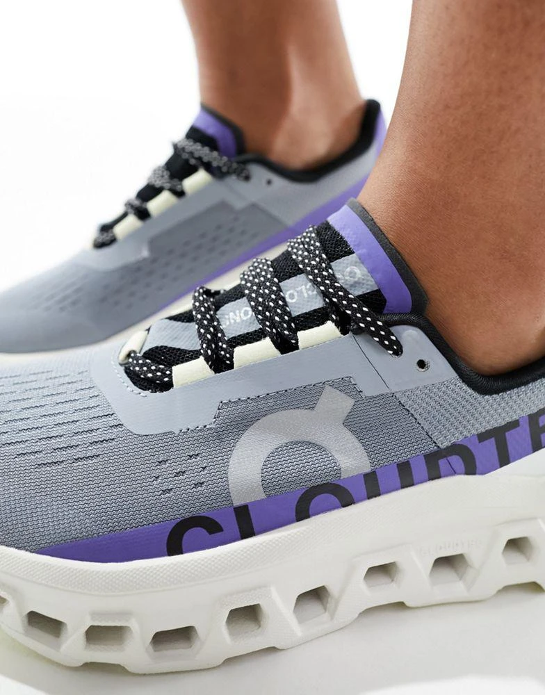 On ON Cloudmonster running trainers in white and purple 3