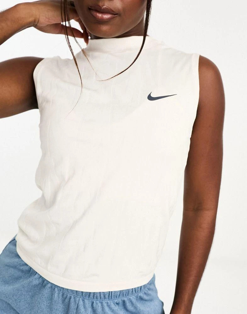 NIKE Nike Running Run Division Dri-FIT mono vest in white 1