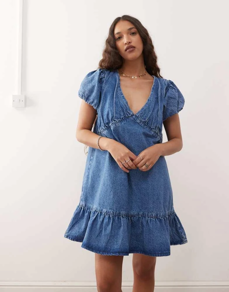 Shop Reclaimed Vintage denim smock mini dress with puff sleeves in midwash  blue on Sale at BeyondStyle  Get 57% Off Reclaimed Vintage denim smock  mini dress with puff sleeves in midwash